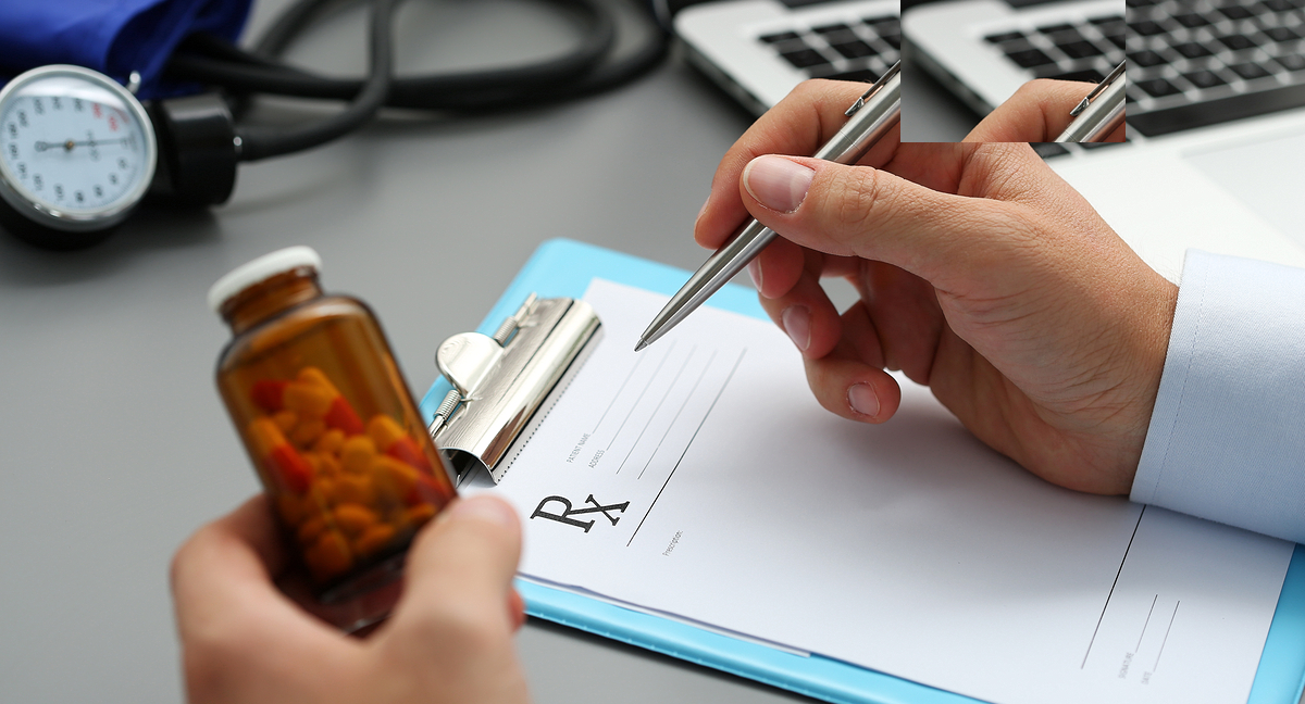 doctor writing prescription