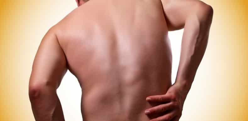 Man holding his back in pain