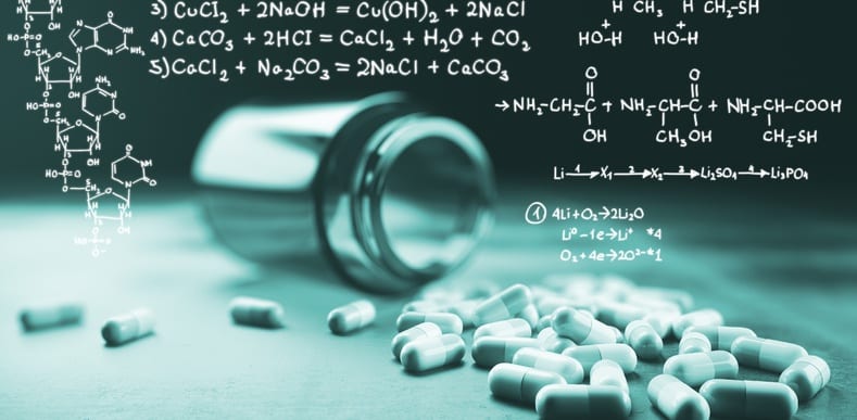 chemical formulas superimposed over pills spilling out of bottle