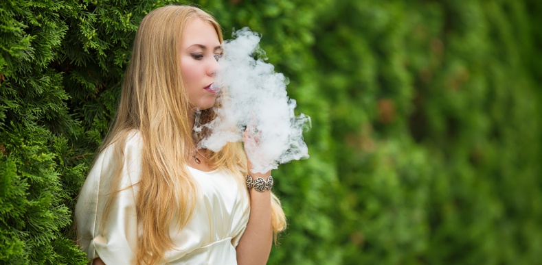 Young girl vaping