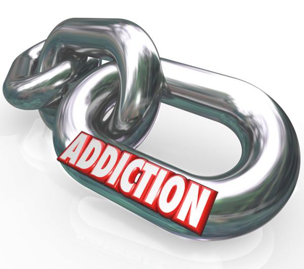Steel chain with the words Addiction on it.