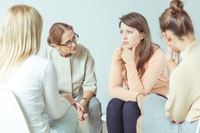 women in AA meeting