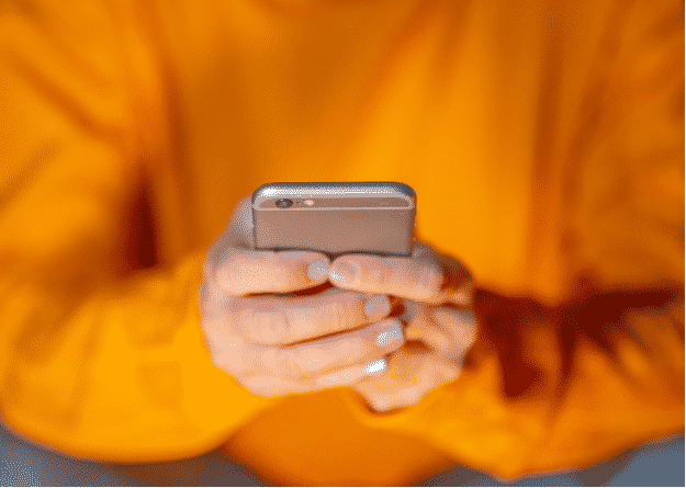 person using smart phone
