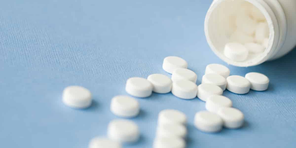 White ativan pills spilling out of a prescription bottle