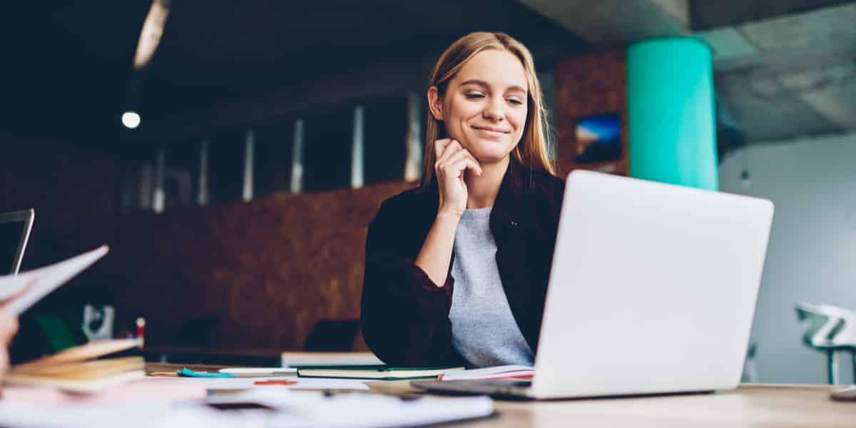 woman smiling after SMART recovery meeting
